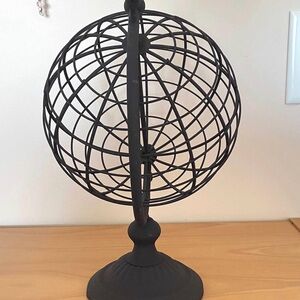 Abstract modern metal wire globe with arrow